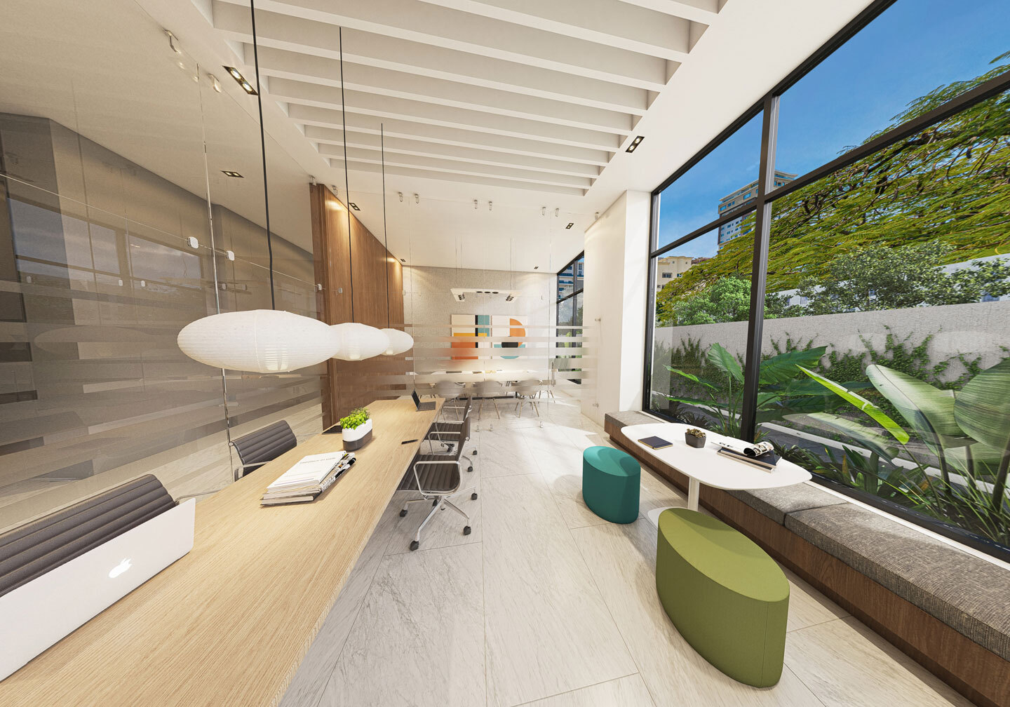 Área de coworking con paredes de cristal